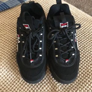 Women’s black fila disruption